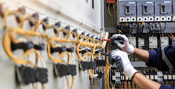 Professional Electrician technician working in Huntsville, TX